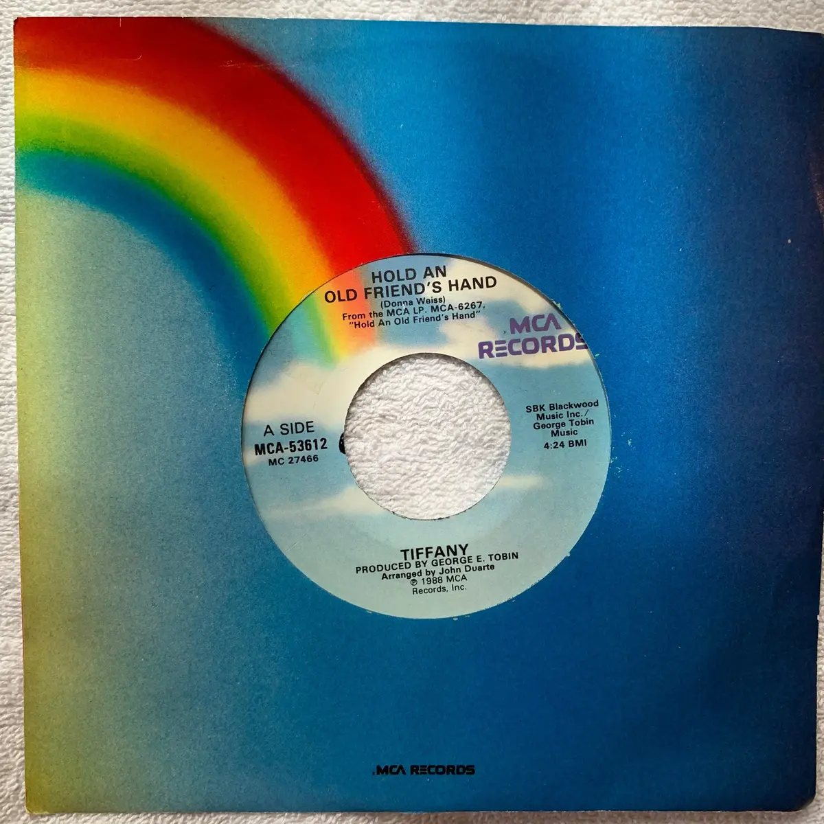 Tiffany -- 45 Record  Hold An Old Friends Hand / Ruthless =  7" Vinyl 1